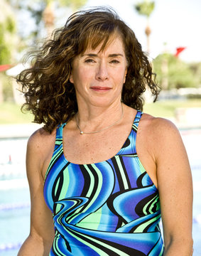 senior woman at an outdoor swimming pool
