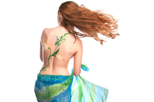 Sexy girl with bodyart on her back