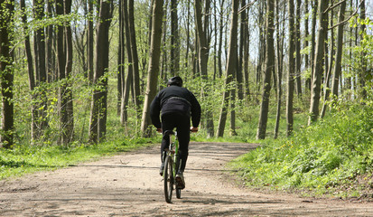 Green forest biker