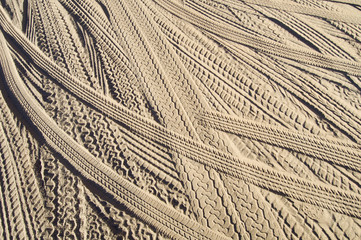 tire tracks in the sand