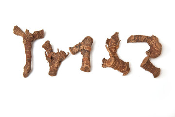 Ginseng isolated on a white studio background.