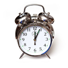 Alarm clock,  isolated on a white studio background.