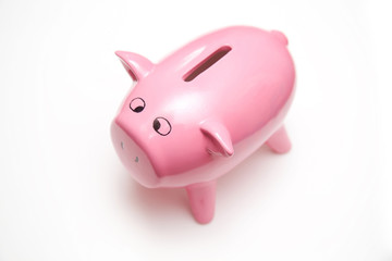 Piggy bank style money box isolated on a white background.