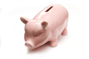 Piggy bank style money box isolated on a white background.
