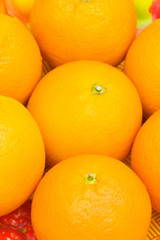 Close up of many oranges on the market