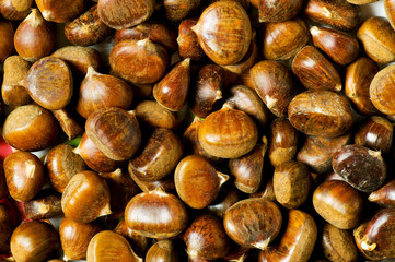 Many chestnuts arranged at the background