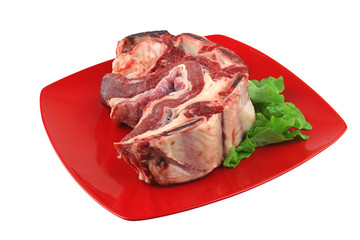 uncooked meat on red dish