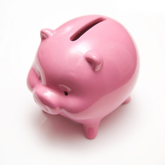 Piggy bank style money box isolated on a white background.
