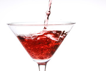 red cocktail on white