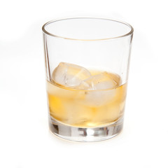 Glass of Scotch whiskey isolated on a white studio background.