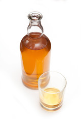 Bottle of Scotch whiskey isolated on a white studio background.