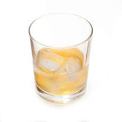 Glass of Scotch whiskey isolated on a white studio background.