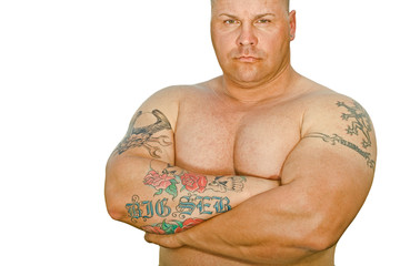 Strong man with tattoo