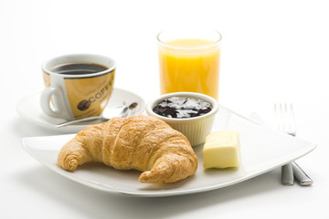 delicious continental breakfast of coffee and croissants