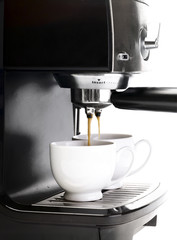 coffee machine with two cup of coffee