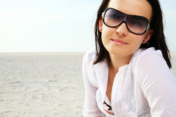 Woman at sunny beach.