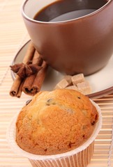 Muffin with coffee,and cinnamons and brown sugar