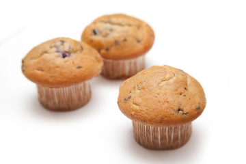 Muffins isolated on a white studio background.