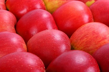 Red apples, food background