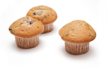 Muffins isolated on a white studio background.