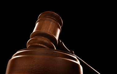 judges court gavel on a black background