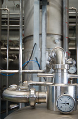 Steel pipes at a processing plant