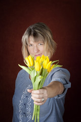 Woman with Yellow Tulips