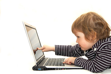 baby girl working on laptop isolated white