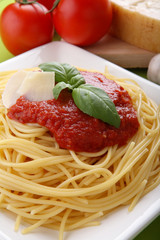 Italian pasta spaghetti with tomato sauce and parmesan.