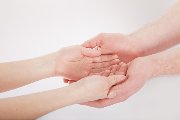 man and woman hands on white