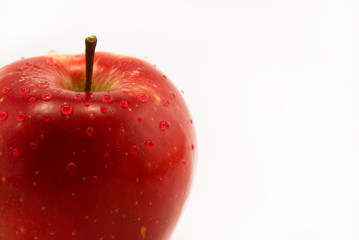 apple with drops on white background
