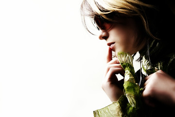 Fashion woman portrait wearing sunglasses on white background