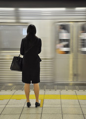Woman waiting for the subway