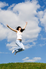 pretty young woman is jumping