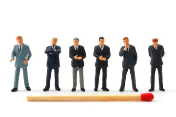 business man and matches on white