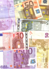 euro notes of different value, colorful background