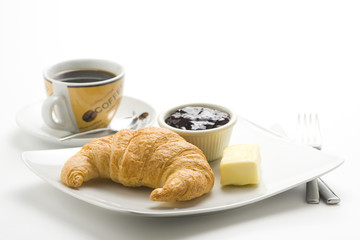 delicious continental breakfast of coffee and croissants