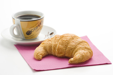 delicious continental breakfast of coffee and croissants