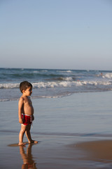 Fototapeta na wymiar Boy at the beach