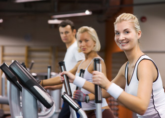 Fototapeta premium Group of people jogging in a gym