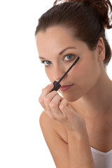 Body care series - Beautiful woman applying mascara