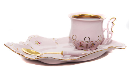 coffee in the procelain cup with spoon