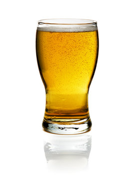 glass of beer isolated over a white background