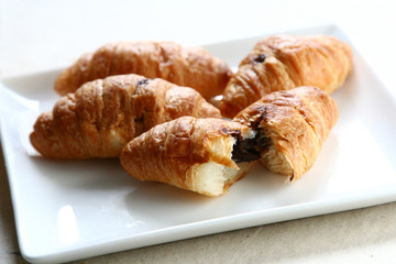 Chocolate Croissants on white dish