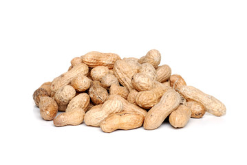 Isolated pile of peanuts in the shell