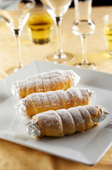 Three rolls filled with sweet cream