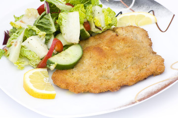 colorful salad and schnitzel