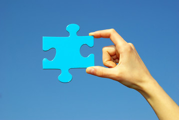 puzzle in hand