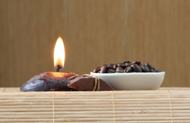 coffee beans and aromatic candle