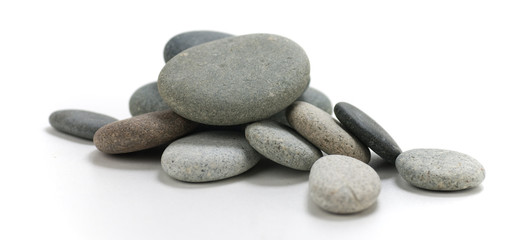 image of fallen stones over white - vertical picture